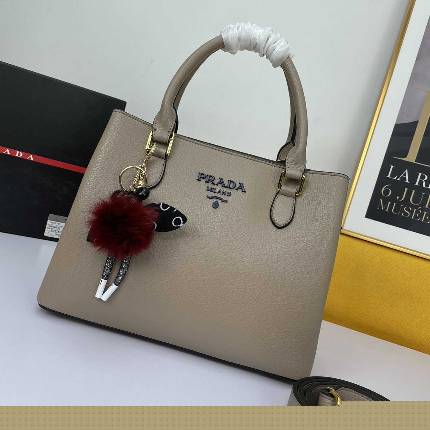 Pra*a top handle bags